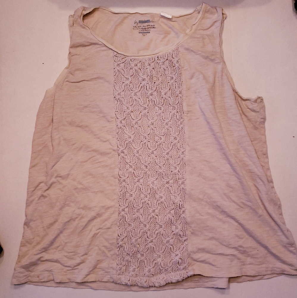 Soft sleeveless cream color shirt